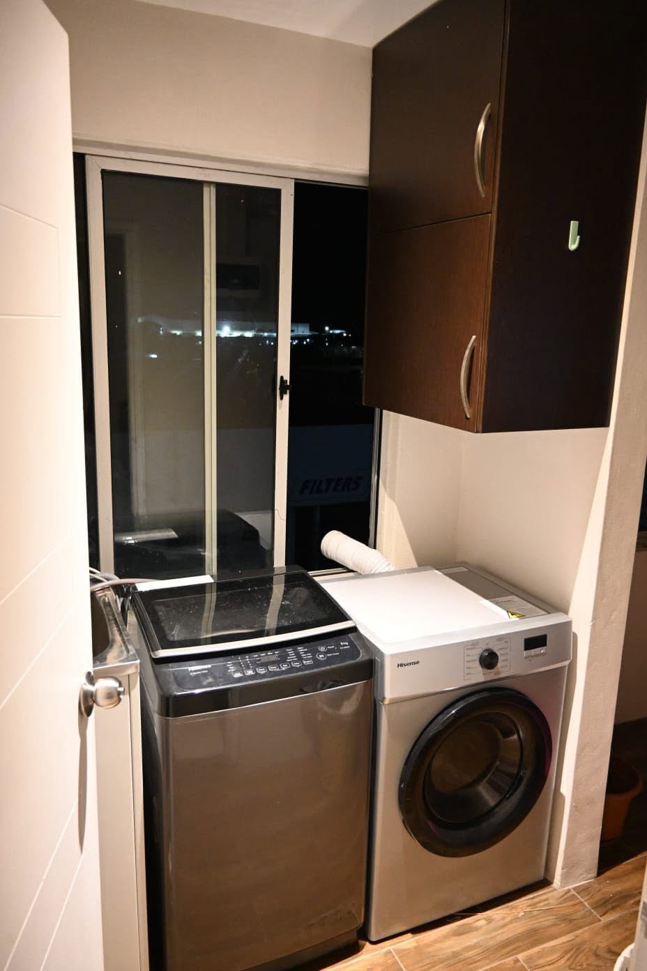 Deluxe Apartment laundry with washer and utility sink
