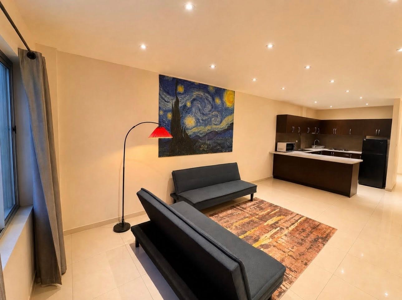 Bright open-plan Family Apartment lounge and kitchen at Bula Bliss