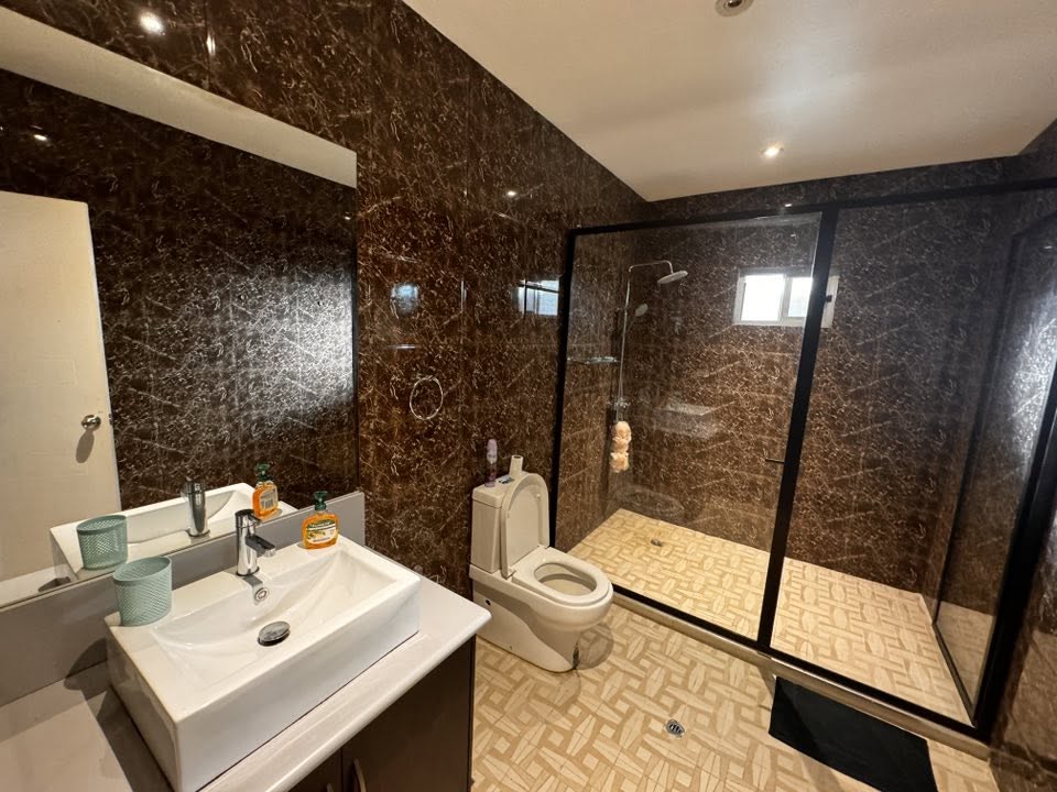 Superior Apartment bathroom with shower and vanity
