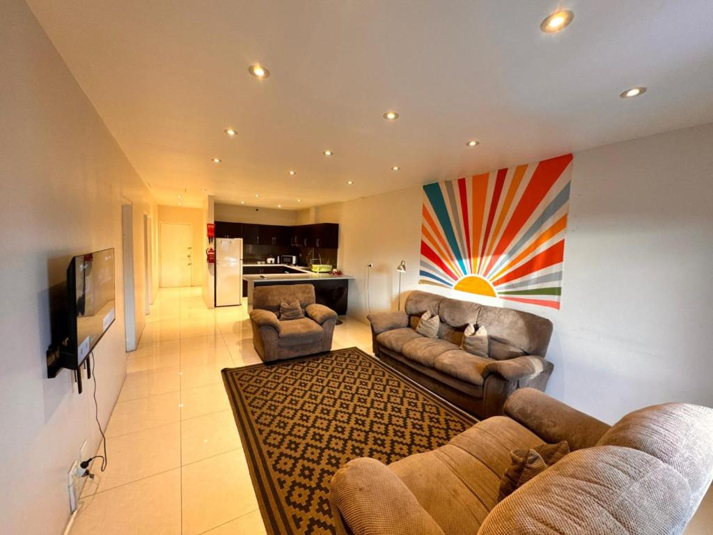 Open-plan Bula Bliss apartment living room and kitchen